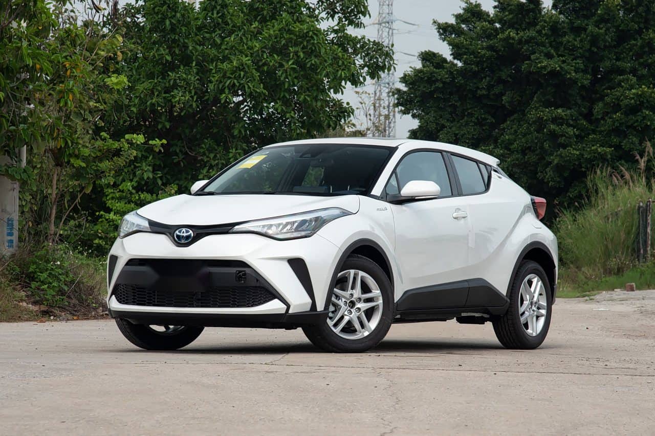 2023 Toyota C-HR Hybrid in white, front three-quarter view