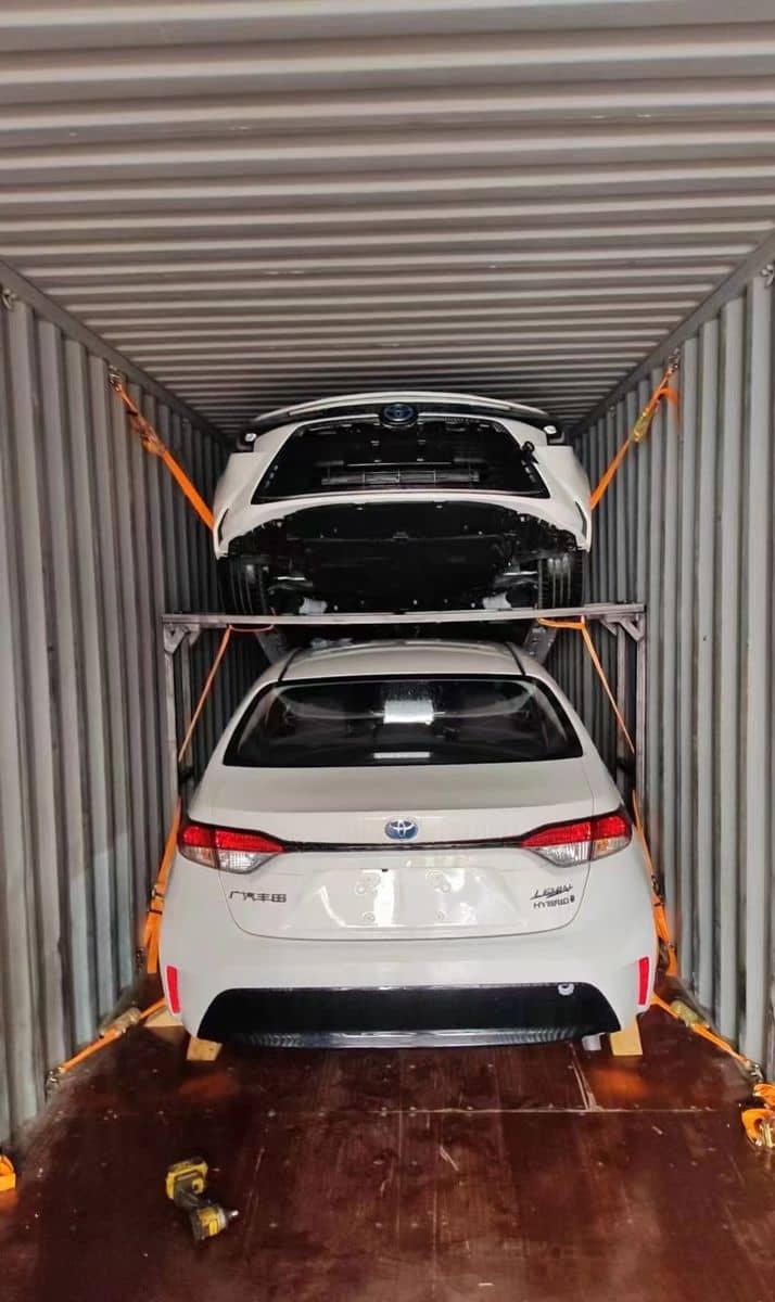 Double-deck racking with two cars inside a 40HQ container